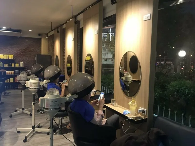 Customers steaming hair for 45 mins at Bee Choo